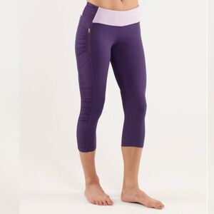 Lululemon Run: In The Sun Crop pants Size 4 Zip Pockets Low Rise Ruching Purple